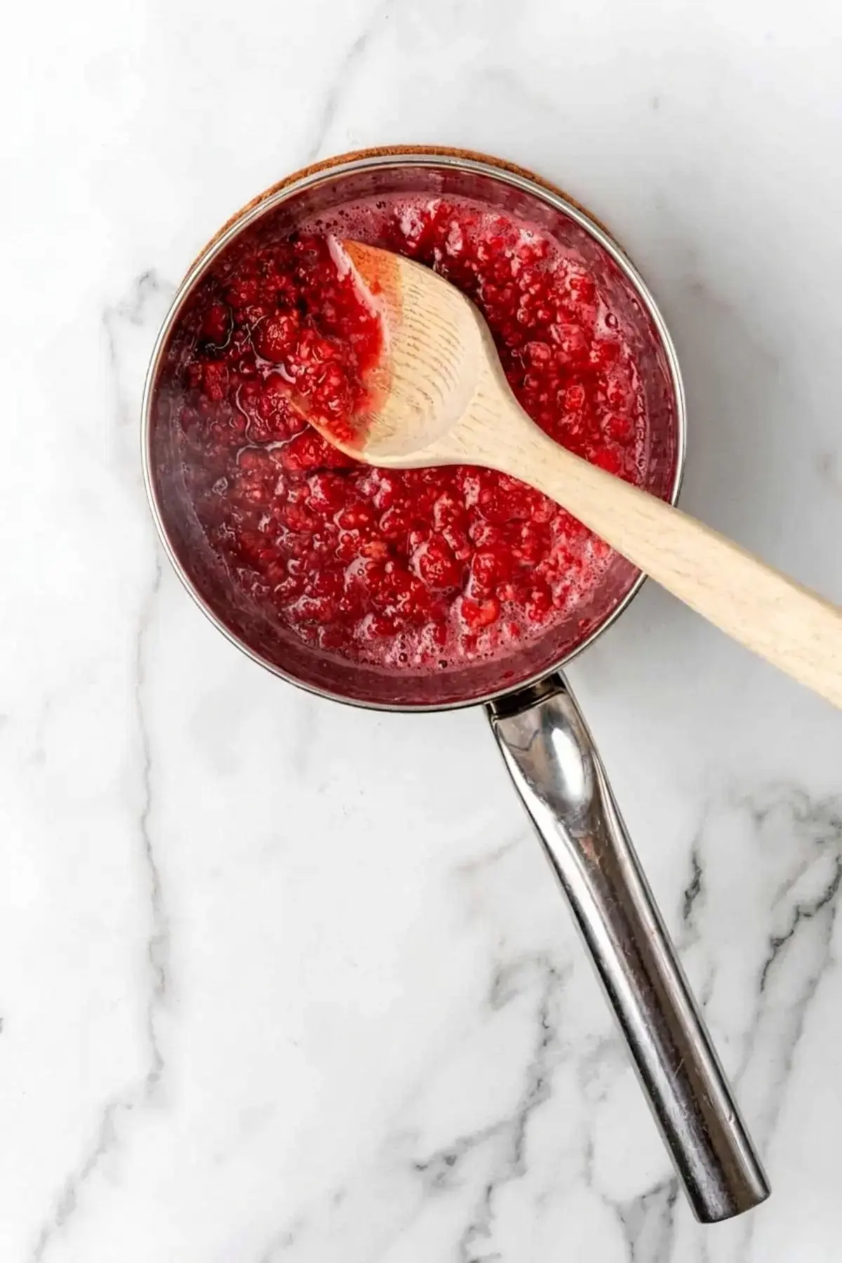 4 Easy Raspberry Sauce Recipes For Every Sweet Tooth 5 4 Easy Raspberry Sauce Recipes, Step 2: Strain Out The Seeds