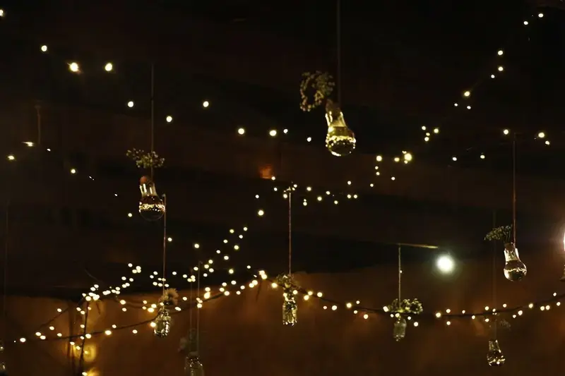 20 String Light Ideas To Create A Cozy Backyard Retreat 26 20 String Light Ideas, 18. Make Little Jar Lights For The Table